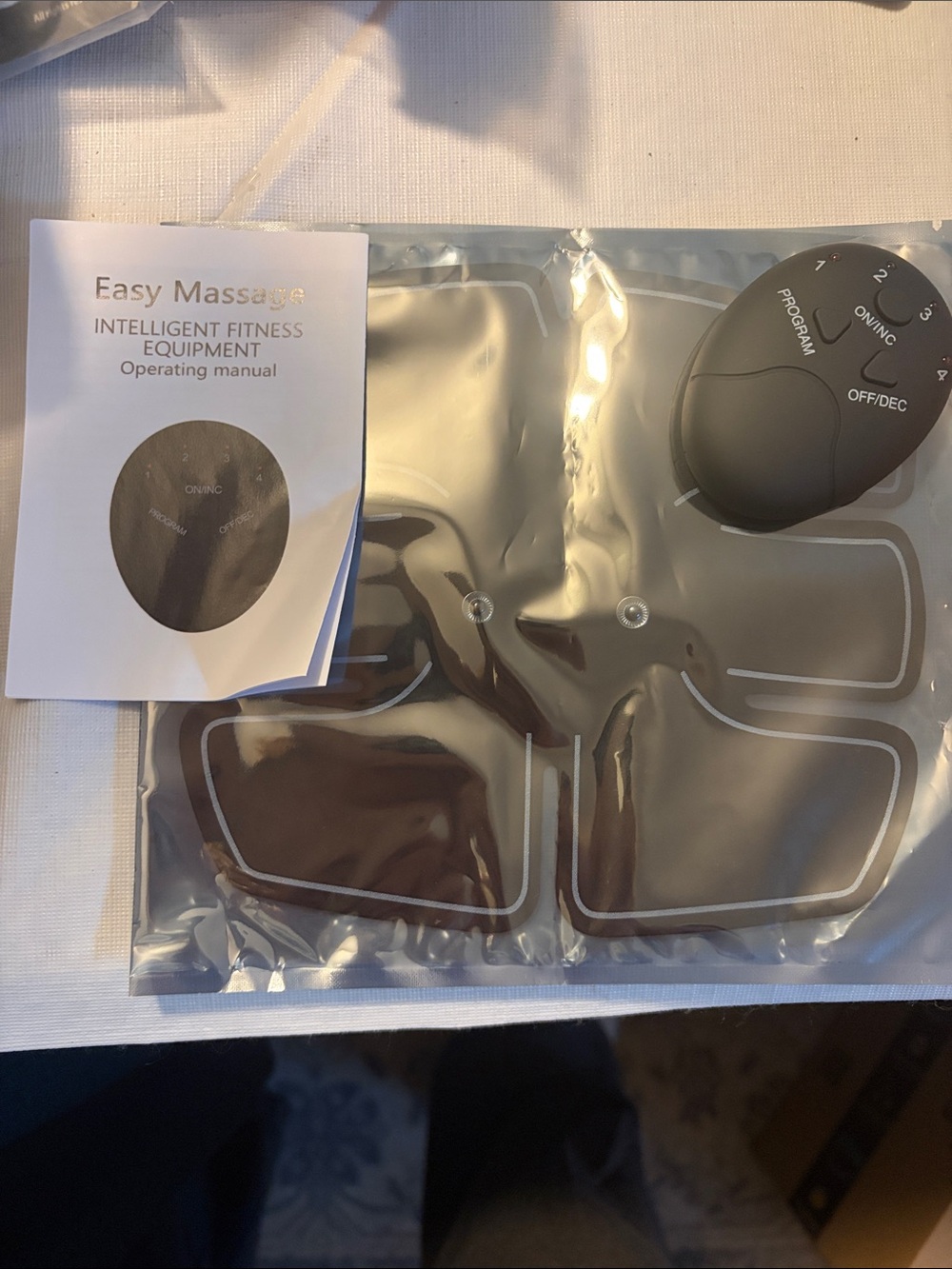 Black Electronic Muscle Stimulator Pad - Portable EMS Therapy